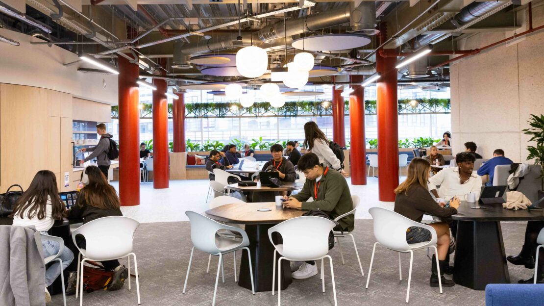 Students in 1 Portsoken building, a part of Northeastern University London's campus in the City of London