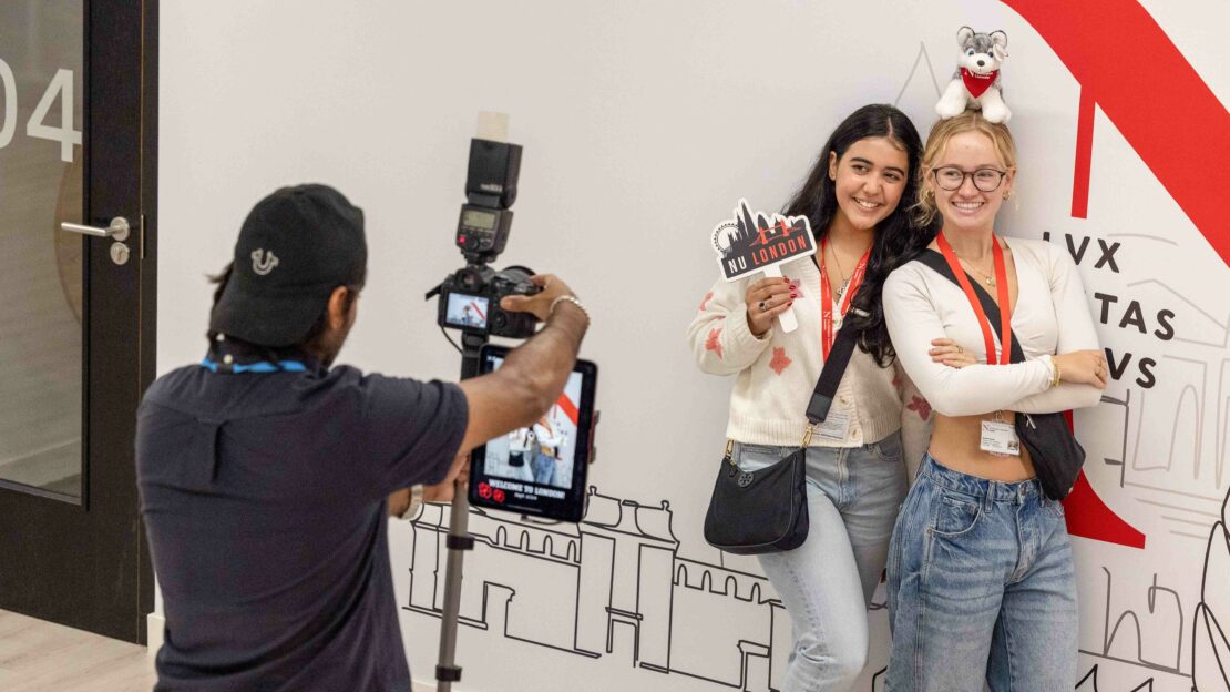 Students posing for pictures at Northeastern University London's welcome week