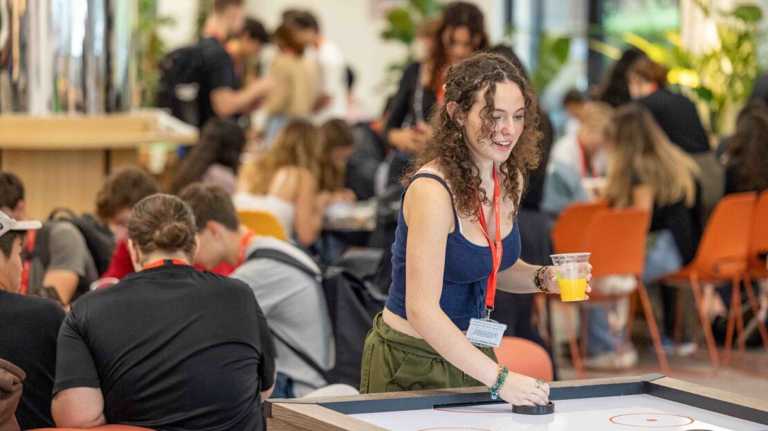 A student playing a game at Northeastern University London